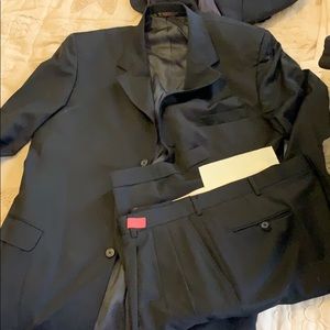 Black 3 button two piece suit.